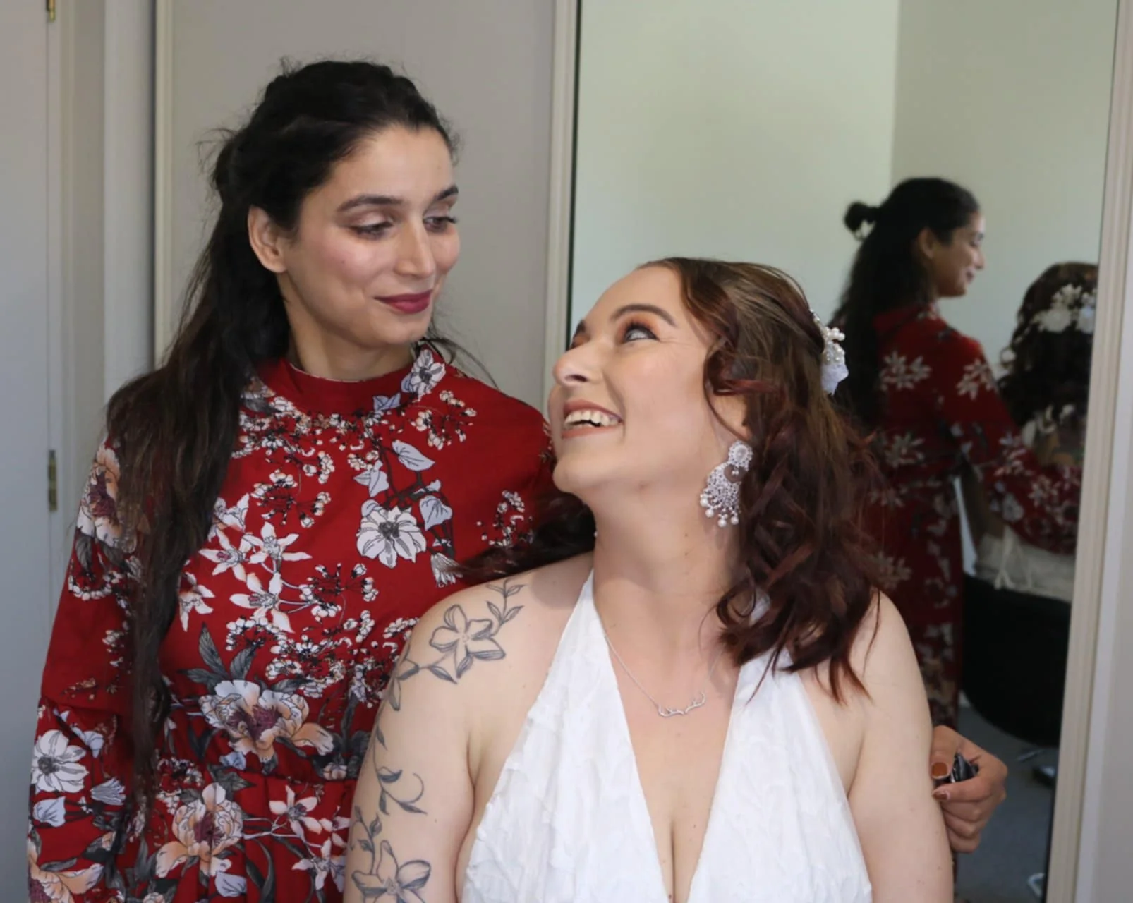 Bride laughing during wedding morning prep